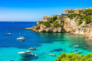 Image of boats in the water off the coast of Palma in Mallorca